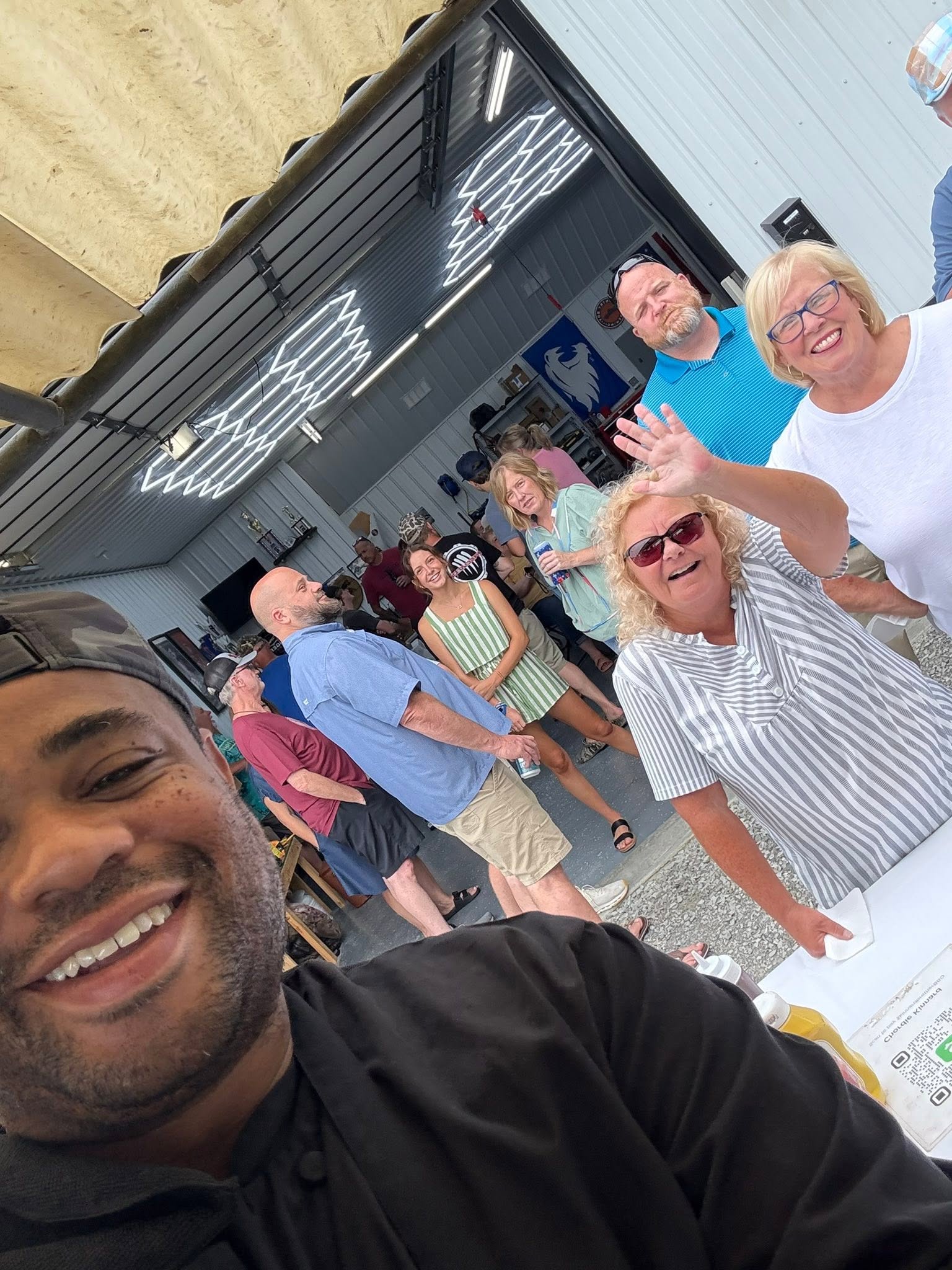 Kinnard Brothers crew selfie with customers
